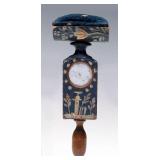 AN ANTIQUE PAINTED SEWING CLAMP PINCUSHION