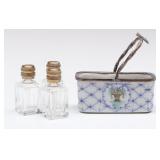 A LIMOGES PORCELAIN BASKET WITH MINIATURE PERFUMES