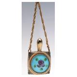 A VINTAGE ENAMELED PERFUME PENDANT