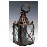 A 19TH CENTURY PIERCED TIN CANDLE LANTERN