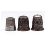 THREE ANTIQUE STERLING SILVER THIMBLES