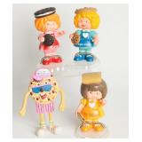 FOUR PLASTIC COOKIE MASCOT ADVERTISING FIGURES