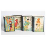 FOUR FAIRY TALE BOOK-FORM TIN LITHO MONEY BOXES