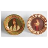 A VIENNA ART PLATE TIN LITHO PLAQUE, PLUS ANOTHER