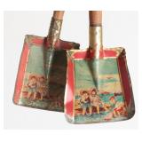 A PAIR OF VICTORIAN TIN LITHO CHILD