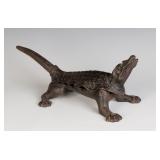 AN ANTIQUE CAST IRON ALLIGATOR CORK PRESS