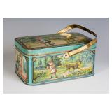 AN ANTIQUE FRENCH TIN LITHO CHILD