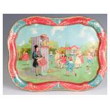 A VICTORIAN TIN LITHO CHILD