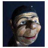 A CARVED AND PAINTED WOOD CARICATURE NUT CRACKER