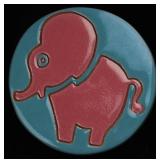 A MID 20TH C. CARVED AND GLAZED ART POTTERY TILE