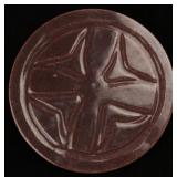 A CIRCULAR ART POTTERY TILE SIGNED CLEVELAND 1923