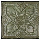 A CIRCA 1900 MATTE GREEN CARVED TERRA COTTA TILE