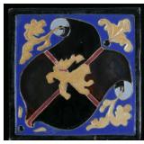 AN EARLY 20TH C. CARVED COAT-OF-ARMS TILE