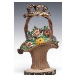 A HUBLEY ANTIQUE FLOWER BASKET CAST IRON DOORSTOP