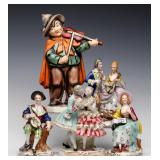 A GATHERING OF COLLECTIBLE FIGURINES