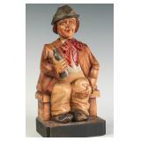 A KARL GRIESBAUM CARVED WOOD WHISTLER