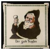 A CIRCA 1900 GERMAN TILE WITH IMBIBING MONK