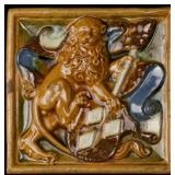 AN ANTIQUE HERALDRY THEME ART TILE WITH LION