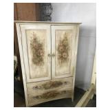 white cabinet with flowers