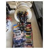 8 New Toy Cars & Bucket of Played with Cars