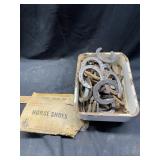 Large Lot of Horseshoes in Enamel Box