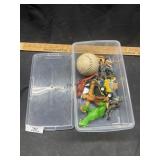 Container w/ action figurines