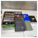 Lot of books. Lot of assorted novels and recipe bo