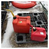(2) Gas Jugs: One 5-gallon And One 2-gallon.