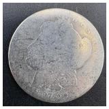 1890-O Morgan silver dollar