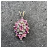 Sterling silver ruby pendant. Weight: 1.3 grams.