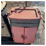 Poly tool cabinet with assorted tools including