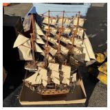 Collectible ship displays including two HMS