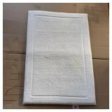 Bath mat approx. 24 x 30 inches (Slight tear)