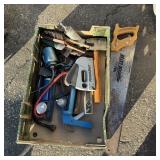 Assortment of tools including PowerShot stapler,