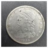 1834 Capped Bust Silver Quarter.