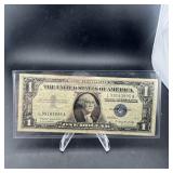 1957-a $1 Silver Certificate Blue Seal. Serial L99