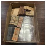 Coin supplies including coin roll wrappers for nic