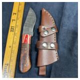 New Damascus steel knife with approximately 3.5-in