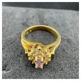 Purple and Clear Stone Ring - As shown.