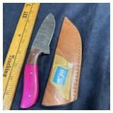 New Damascus steel knife, approximately 3.5-inch b