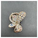 Butterfly Clip - As shown.