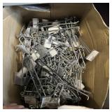 Assorted Pegs With Price Tags; Assortment Of Pegs