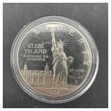 1986 Ellis Island Proof Silver Dollar