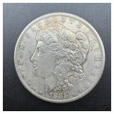 1885-O Morgan Silver Dollar Higher Grade