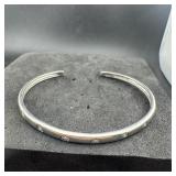 Sterling silver cuff bracelet with sun design; mar