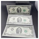 Three $2 bills; 1976 green seal; consecutive seria