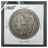 1885 Morgan silver dollar; circulated condition; h