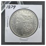 1879 Morgan silver dollar; circulated condition; h