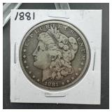 1881 Morgan silver dollar; circulated condition; h