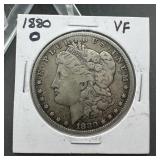 1880-O Morgan silver dollar; New Orleans mint; mar